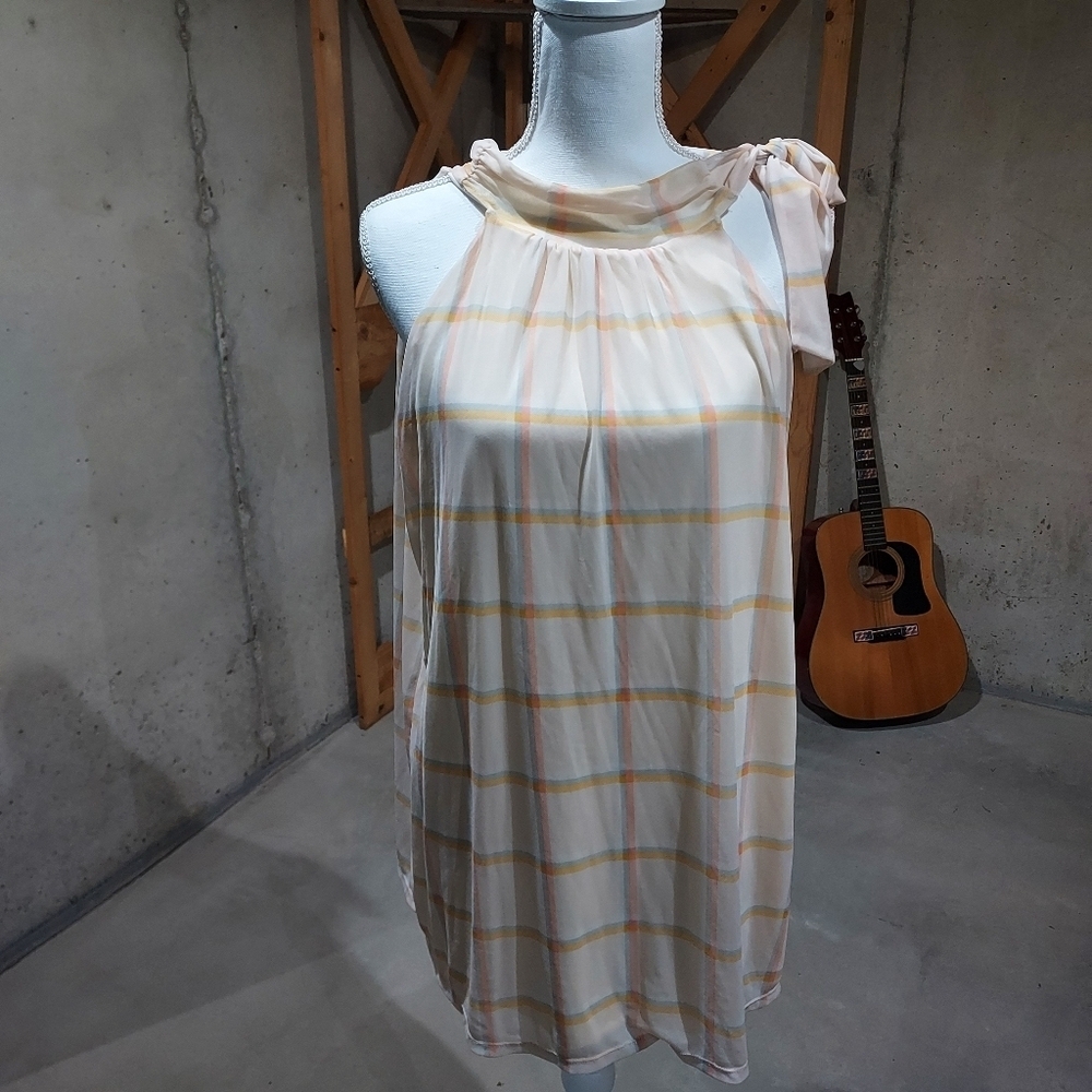 Womans flowing sleeveless top